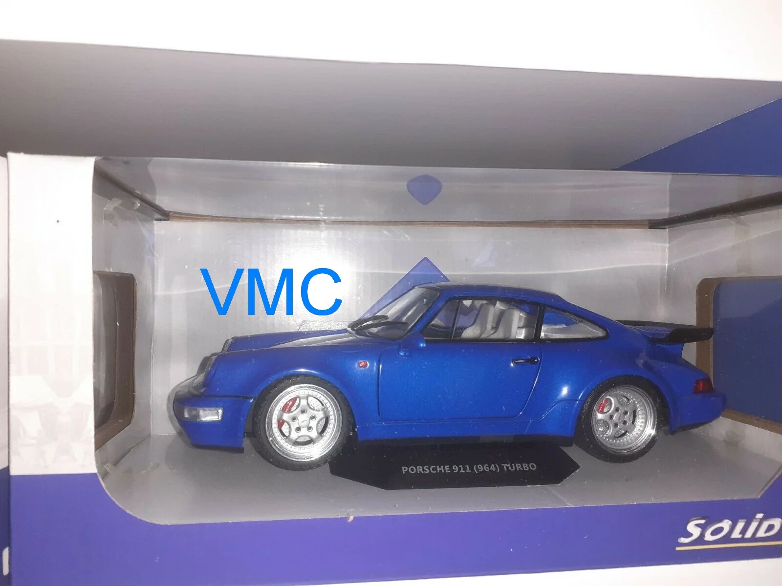 PORSCHE 911 TURBO BLEU ELECTRIQUE 1990 1/18 solido